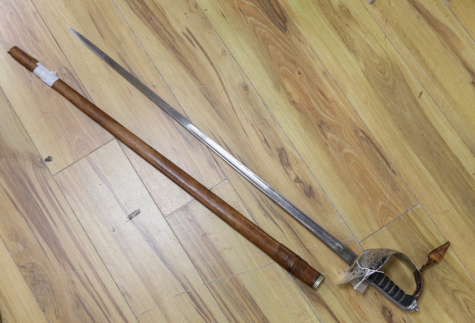 A Wilkinson George V officer's dress sword, stamped 1930 with broad arrow